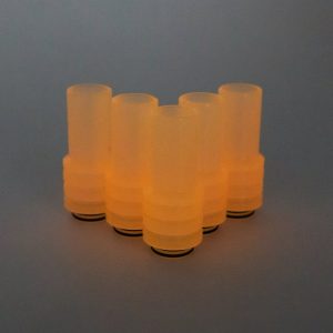 Frosted Orange UV Sniper Drip Tip in the dark